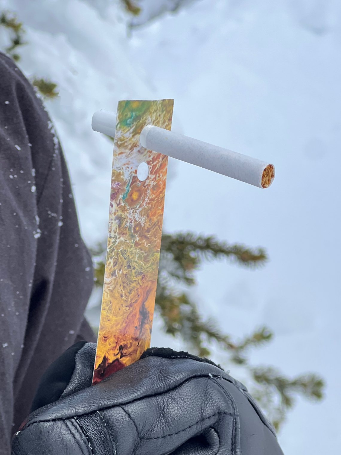 Stinky Pinky yellow disposable cigarette holder – biodegradable joint holder for outdoor and travel use.